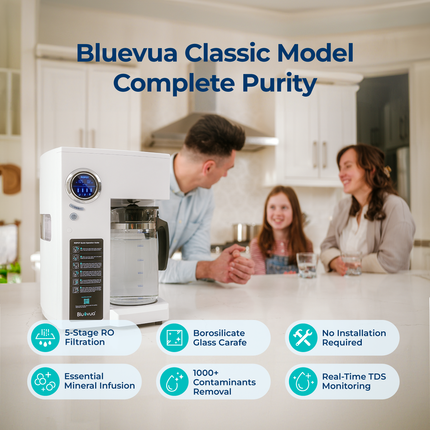 Family enjoying water from Bluevua countertop RO system with glass carafe.
